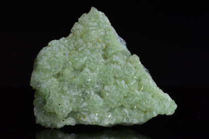 Crystals of prehnite and actinolite from Boulemane, Morocco, showcasing green and gray mineral formations.