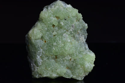 Prehnite and actinolite crystal from Boulemane, Morocco, showcasing green mineral formations in a natural mineral specimen.