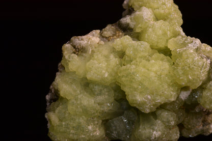 Crystals of prehnite and actinolite from Boulemane, Morocco, displayed together as mineral specimens.