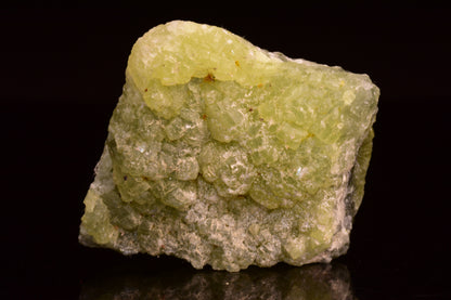 Prehnite and actinolite crystal from Boulemane, Morocco showing green and gray mineral formations on a mineral specimen.