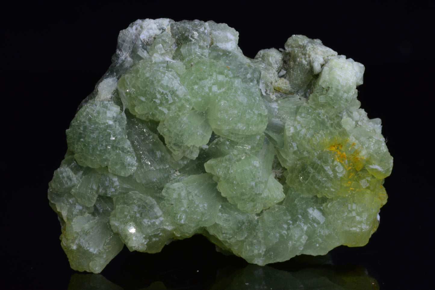 Prehnite and actinolite crystal from Boulemane, Morocco, showcasing green and gray mineral formations.