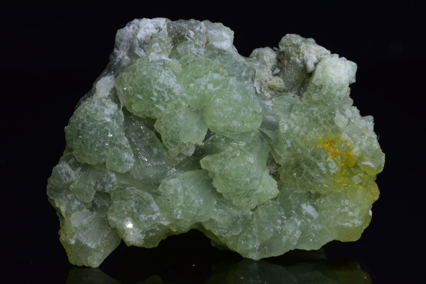 Prehnite and actinolite crystal from Boulemane, Morocco, showcasing vibrant green mineral formations.