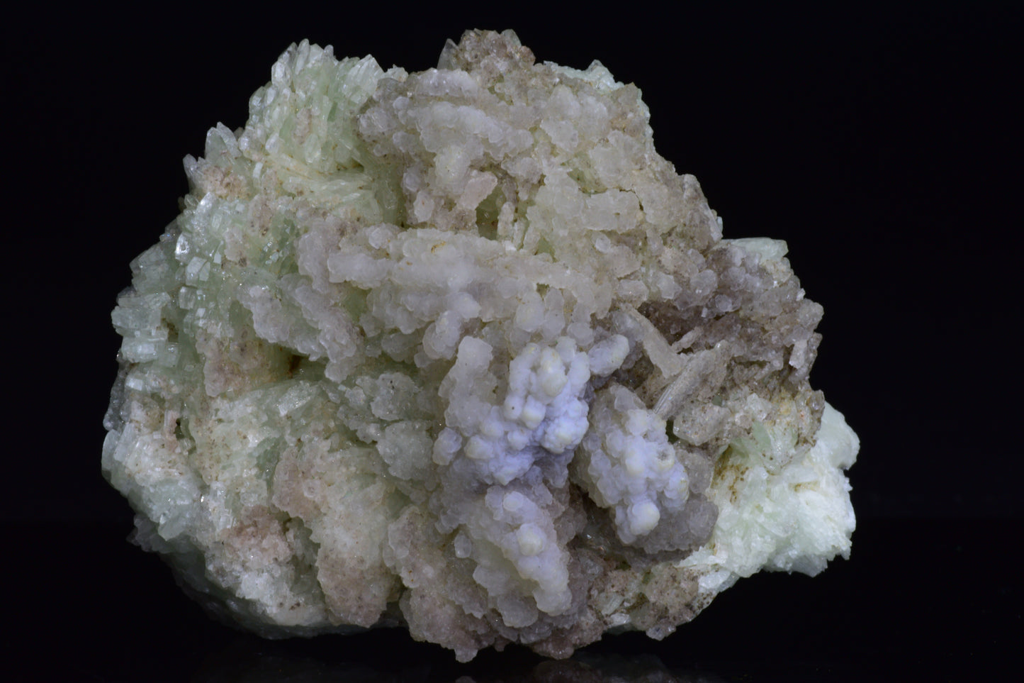 Prehnite crystal from Imilchil, Morocco, weighing 158.3 grams, with smooth, translucent green mineral surface.