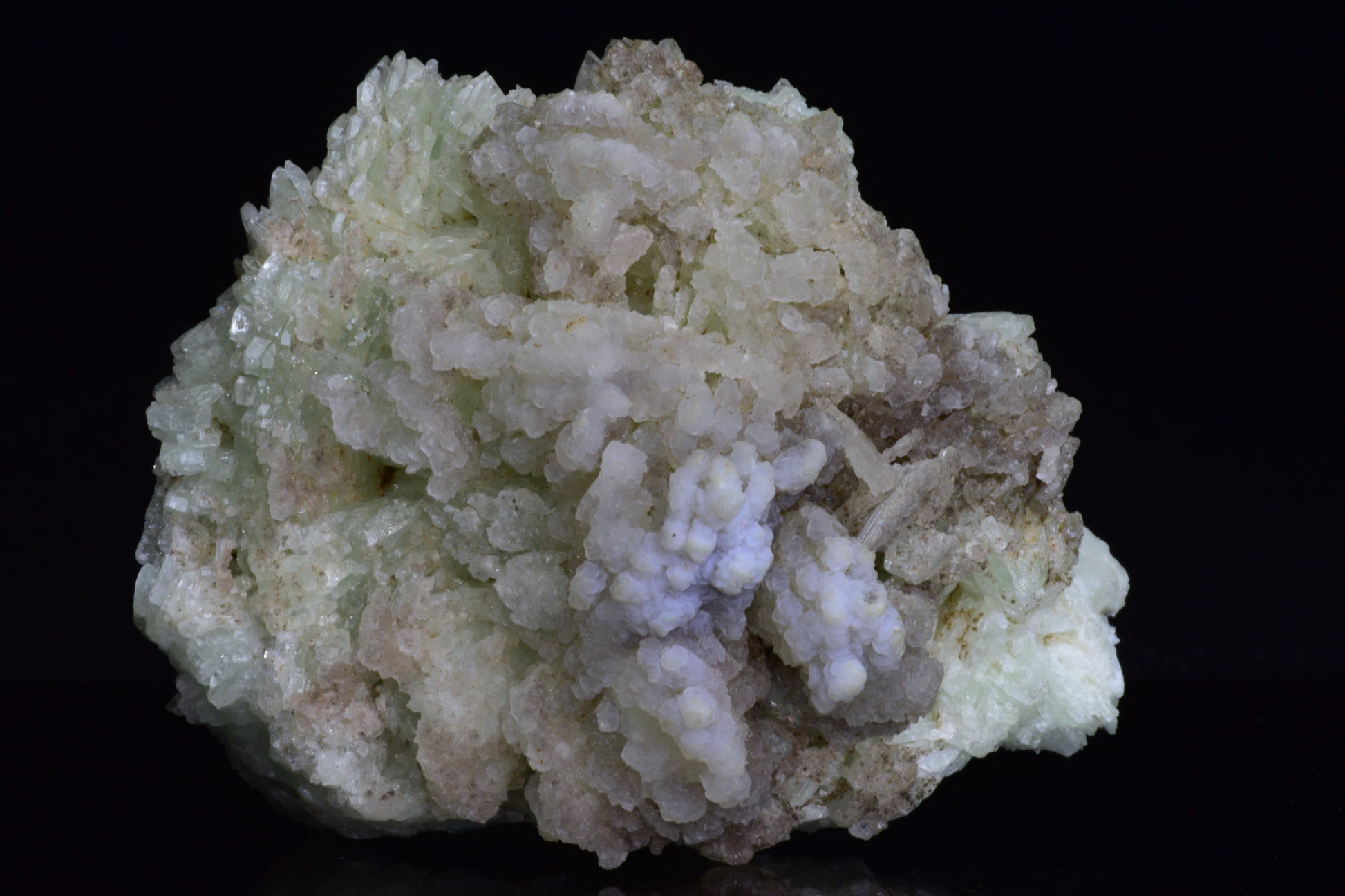Prehnite crystal from Imilchil, Morocco, weighing 158.3 grams, with smooth, translucent green mineral surface.