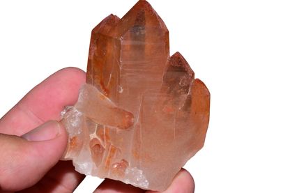 Natural red quartz cluster displayed on acrylic stand, Errachidia Province Morocco