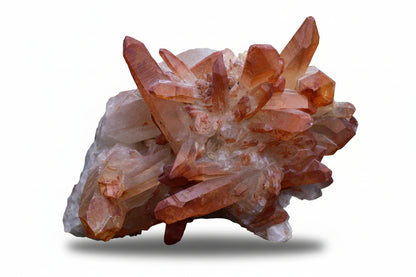 Large red quartz crystal cluster with ferruginous inclusions from Tinejdad, Morocco, showcasing vibrant mineral formation and natural mineral beauty.