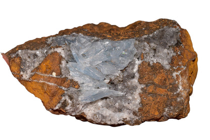 Buy Meteorite LLC transparent blue barite crystal cluster on a brown matrix from Jebel Ouichane, Morocco.