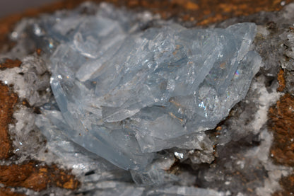 Buy Meteorite LLC transparent blue barite crystal cluster from Jebel Ouichane, Morocco, featuring lustrous bladed forms.