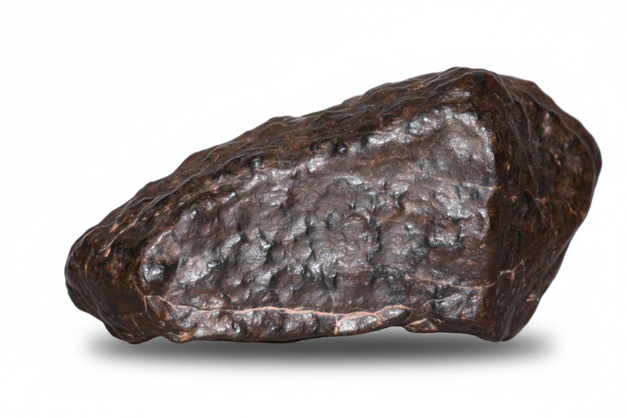 Natural NWA 13272 ungrouped achondrite meteorite fragment, 10.5g, showcasing its rocky surface and unique mineral texture.
