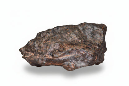 Natural NWA 13272 Ungrouped Achondrite meteorite fragment, 10.8 g, with a textured, metallic surface and unique extraterrestrial appearance.