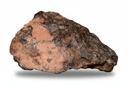 Natural NWA 13272 ungrouped achondrite meteorite fragment, 11.6 g, showing rough, textured surface with unique mineral patterns.