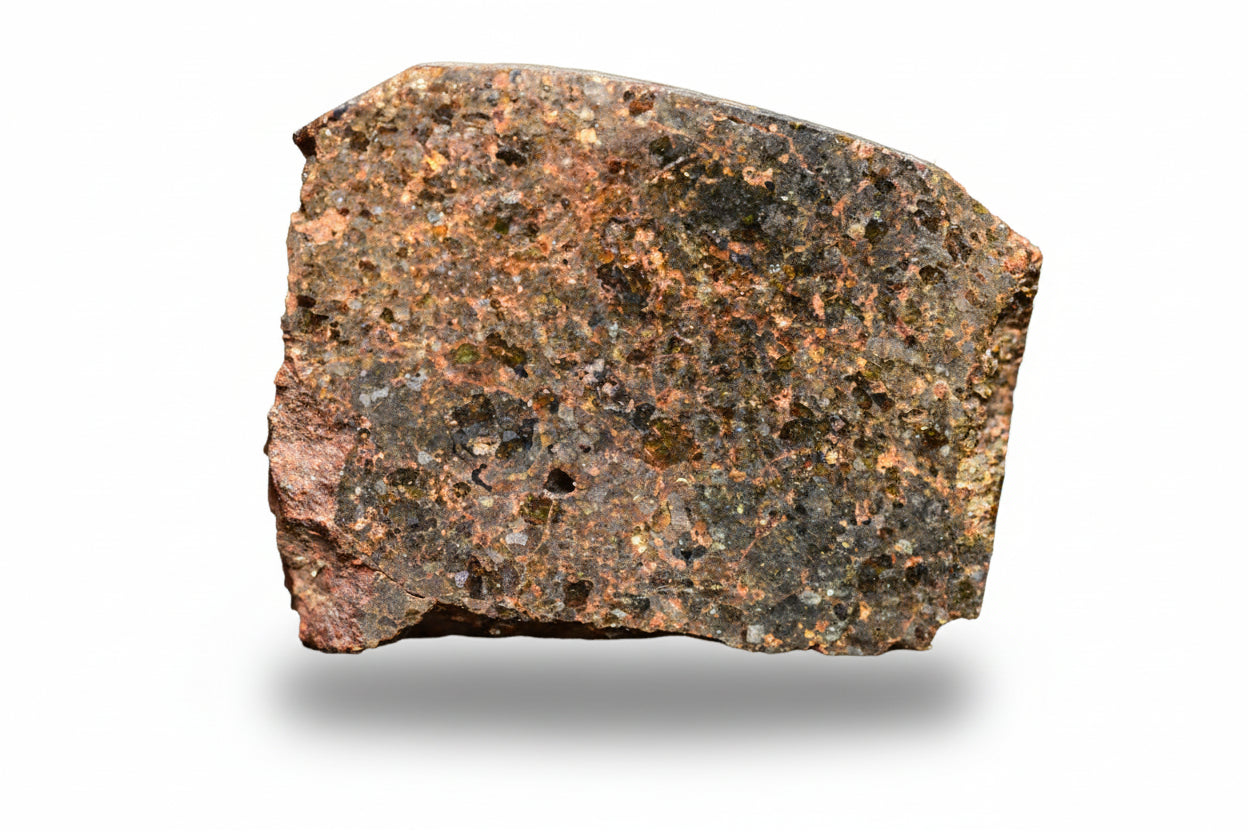 Brachinite NWA 11756 meteorite slice showing dark mineral matrix and metallic inclusions, weighing 3.07 grams.