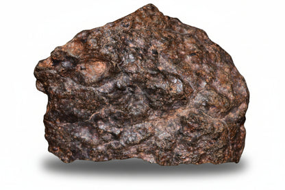 Natural fragment of NWA 13272 ungrouped achondrite meteorite, showing rough, dark surface with mineral textures, weighs 11.5 grams.