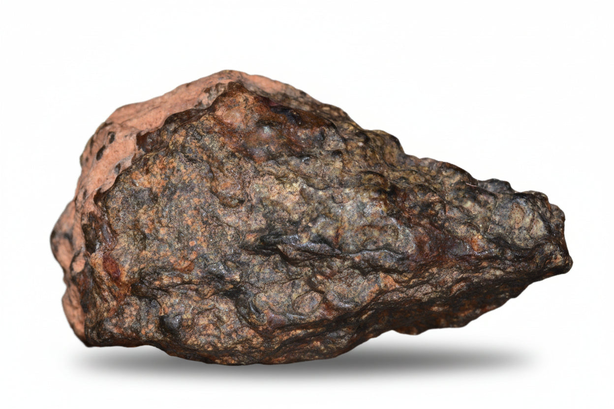Complete NWA 13272 ungrouped achondrite meteorite fragment, natural 11.6g sample for sale, showing rocky surface and unique mineral features.