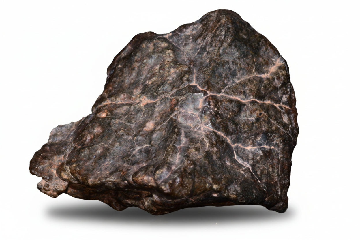 Rare NWA 13272 ungrouped achondrite meteorite fragment, natural 17.7g piece, showcasing unique surface features and mineral texture.