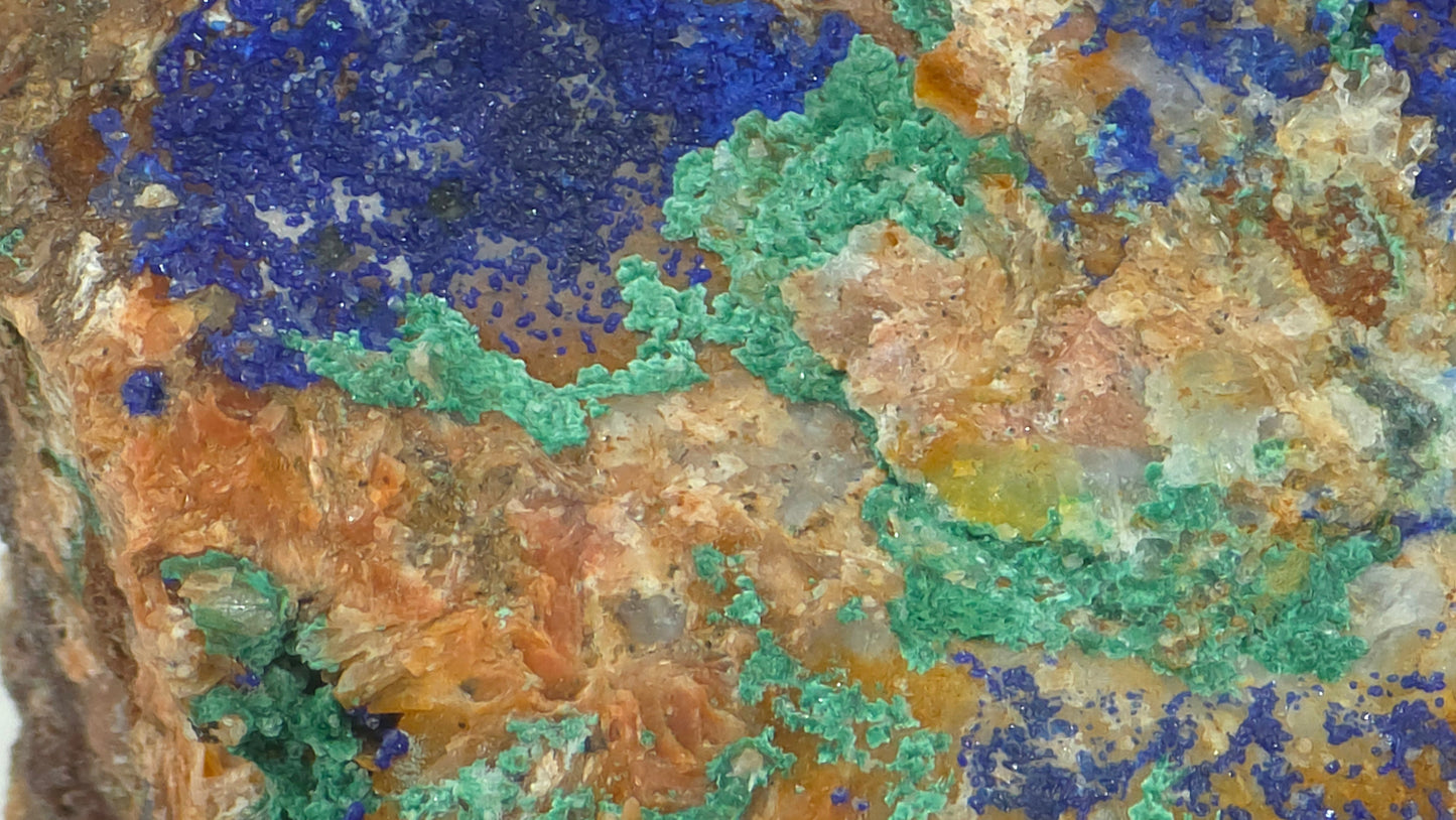 Natural Malachite with Azurite on Quartz – Mibladen, Morocco, velvety malachite surface with azurite pockets macro