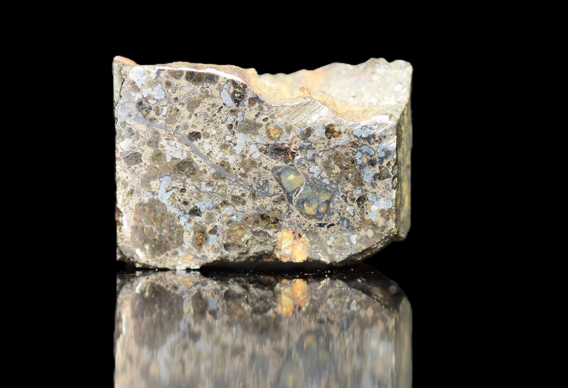 Talsint mesosiderite meteorite slice 0.70 g from Morocco showing brecciated silicate and metal matrix